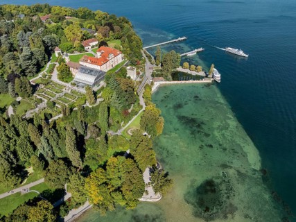 The island of Mainau in Lake Constance with the jetty and the baroque Mainau Castle, built between