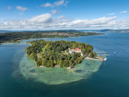 The island of Mainau in Lake Constance with the jetty and the baroque Mainau Castle, built between