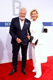 Hera Lind with man Engelbert Lainer-Wartenberg arriving at the Bertelsmann Summer Party 2025 at the