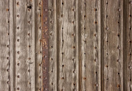 Full frame abstract detail of a weathered wooden facade