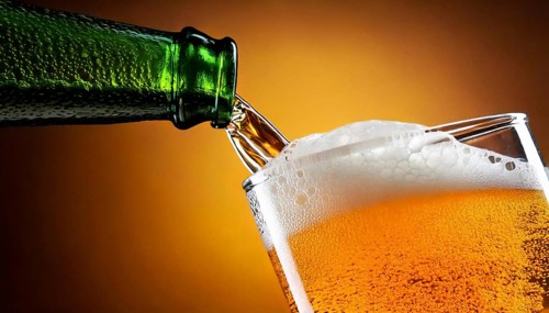 AI generated closeup image showing a bottle while pouring beer in a glass