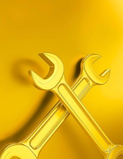 AI generated image showing crossed golden wrenches in golden ambiance