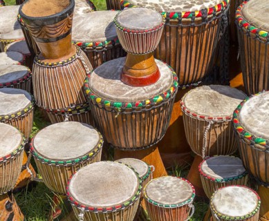 Lots of african djembe drums in sunny ambiance
