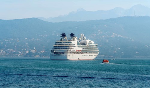 Cruise ship seen in Liguria, a region of north-western Italy in misty ambiance