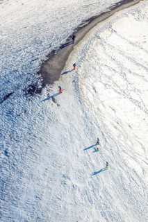 Aerial view, pedestrians, sledges and skis in the snow at the Mottbruchhalde, Brauck, Gladbeck,