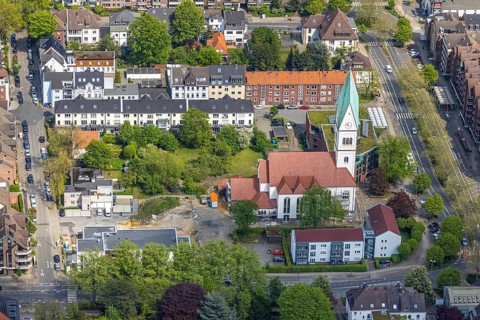 Aerial view, Christ Church and construction site of new kindergarten, former Bonhoeffer House,