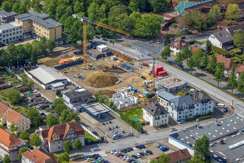 Aerial view, construction site new building for housing and social affairs, former Mercedes-Lueg