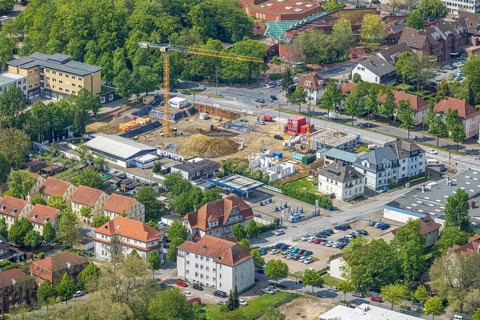 Aerial view, construction site new building for housing and social affairs, former Mercedes-Lueg