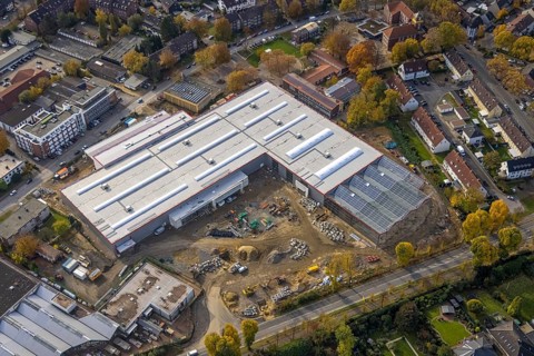 Aerial view, industrial area Krusenkamp with construction site and new building for planned DIY