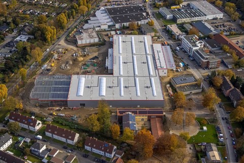 Aerial view, industrial area Krusenkamp with construction site and new building for planned DIY
