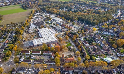 Aerial view, industrial area Krusenkamp with construction site and new building for planned DIY