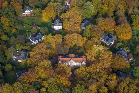 Aerial view, music school of the city of Gladbeck in the autumnal forest in the district Rentfort