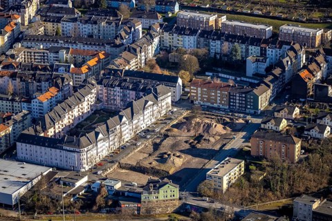 Aerial view, construction site demolition Block-1 Karree, planned new building kindergarten and