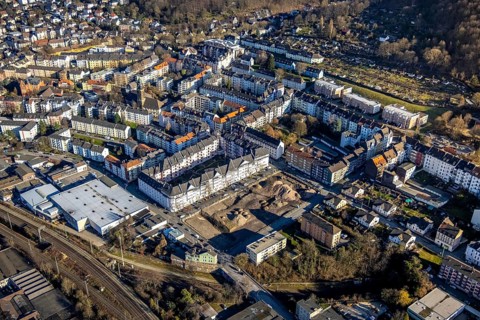 Aerial view, construction site demolition Block-1 Karree, planned new building kindergarten and