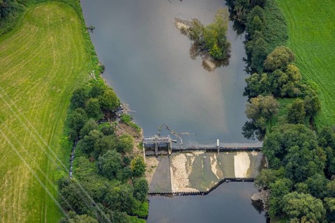 Aerial view, driftwood at the weir at the river Lenne in the district Boele in Hagen, Ruhr area,
