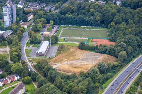 Aerial view, construction site next to the volunteer fire brigade and the Emst district sports