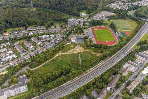 Aerial view, fallow land at the Kirchenbergstadion with planned construction of a fitness centre in