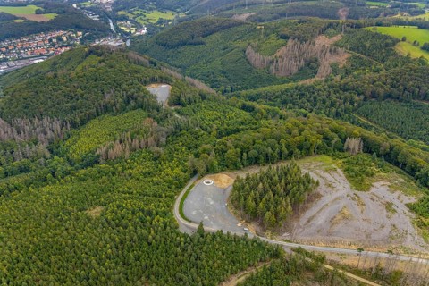 Aerial view, forest area with planned wind turbine construction in Veserde in