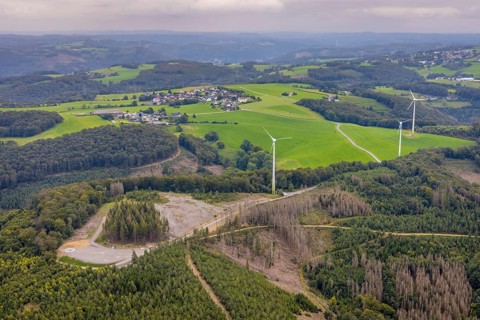 Aerial view, forest area with planned wind turbine construction in Veserde in