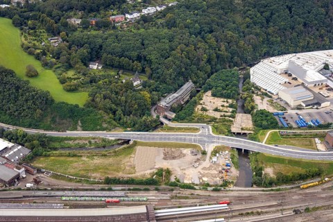 Aerial view, Westside City construction area and construction site between new road with river