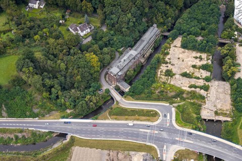 Aerial view, Westside City construction area and construction site between new road with river
