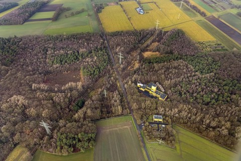 Aerial view of Ost Schacht Sandbochum mine in a forest area, steag substation Sandbochum,