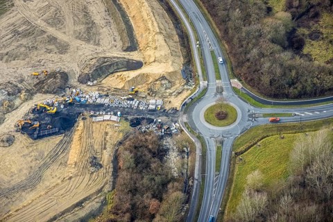 Construction area at Sachsenring with roundabout with housing estate in the district of Heessen in