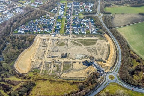Construction area at Sachsenring with roundabout with housing estate in the district of Heessen in