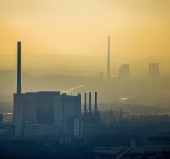 Aerial view of RWE Power AG power plant Gersteinwerk in backlight and STEAG power plant Bergkamen