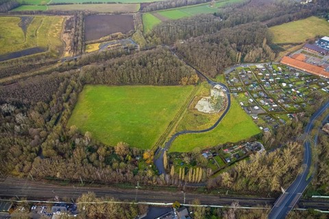 Aerial view source of the Hoppeibach at Pelkum railway station with field and building area Kamemer