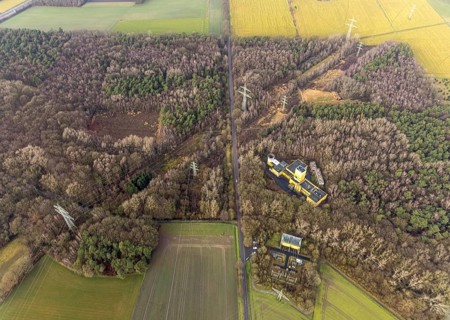 Aerial view of Ost Schacht Sandbochum mine in a forest area, steag substation Sandbochum,