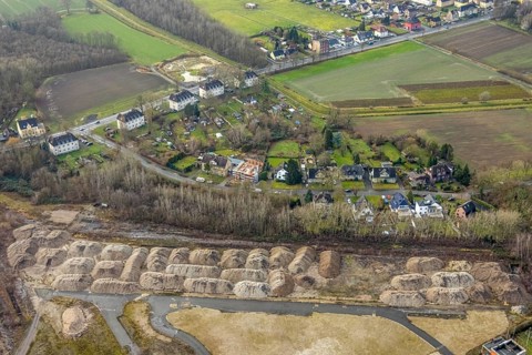 Aerial view sand hill at Ost colliery and construction site in Goerallee in Hamm, Ruhr area, North