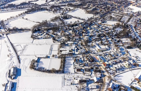 Aerial view, snow-covered sports facility, snow on roofs and streets, VFL Mark, Realschule Mark,