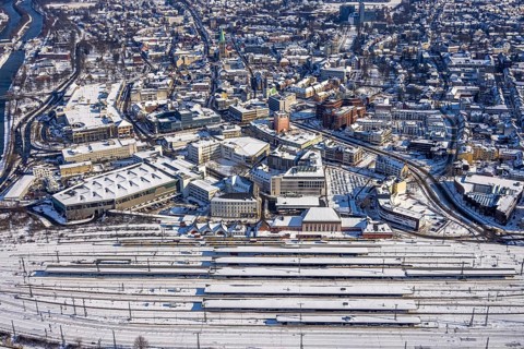 Aerial view, Hamm main station, tracks and platforms in the snow, winter, city centre,