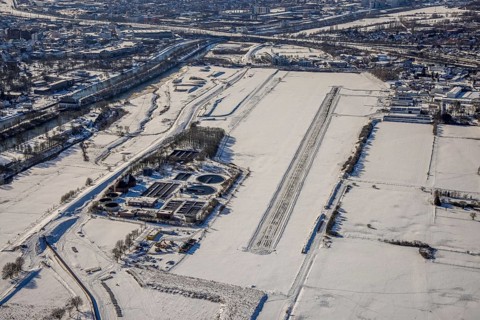 Aerial photo, EDLH airfield in the snow with cleared runway, Mattenbecke sewage treatment plant,