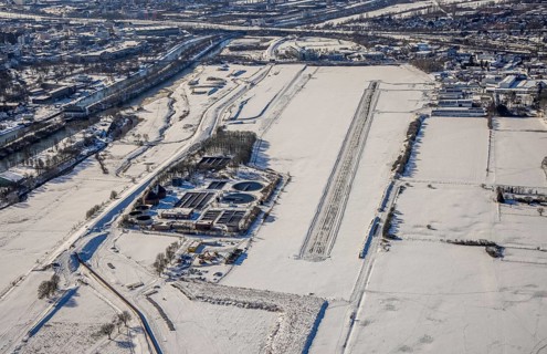 Aerial photo, EDLH airfield in the snow with cleared runway, Mattenbecke sewage treatment plant,