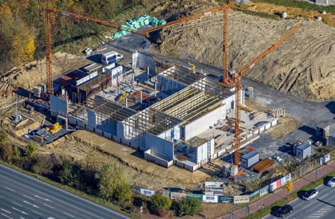 Aerial view, construction area and new building for Mensing Galerie corner Werler Straße and Unnaer