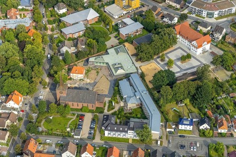 Aerial view, catholic Heilig Kreuz church and Caritas retirement home St. Josef in the district of