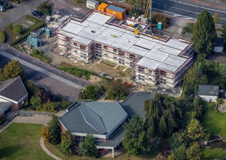 Aerial view, construction site and new construction of senior citizens' flats Alter Uentroper Weg