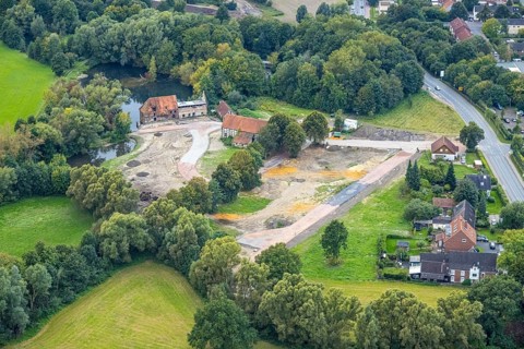Aerial view, construction site and renovation of the Schlossmühle am Mühlengraben am Mühlenteich in