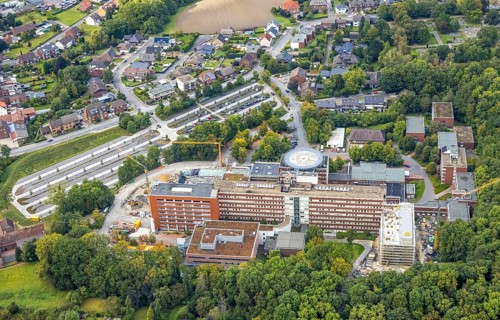 Aerial view, construction site with extension at the St. Barbara Clinic in the district of Heessen