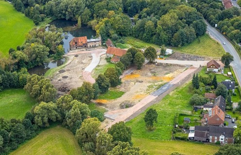 Aerial view, construction site and renovation of the Schlossmühle am Mühlengraben am Mühlenteich in
