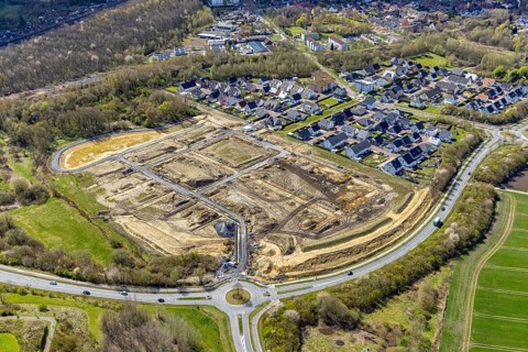 Aerial view, construction site and construction area Heimshof Ost am Sachsenring with housing