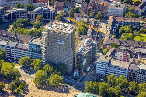 Aerial view, construction site, new building complex with residential tower and senior citizens'