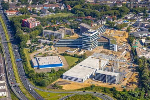 Aerial view, construction site and new construction ALDI-Nord Campus on the A40 motorway, Am