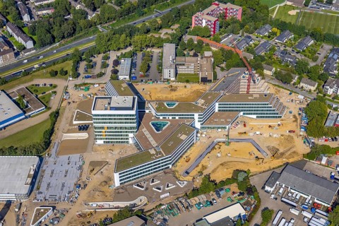 Aerial view, construction site and new construction ALDI-Nord Campus on the A40 motorway, Am