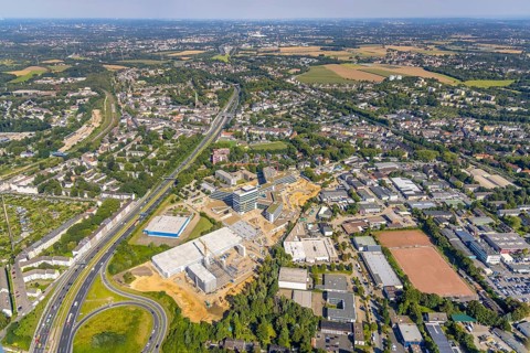 Aerial view, construction site and new construction ALDI-Nord Campus on the A40 motorway, Am