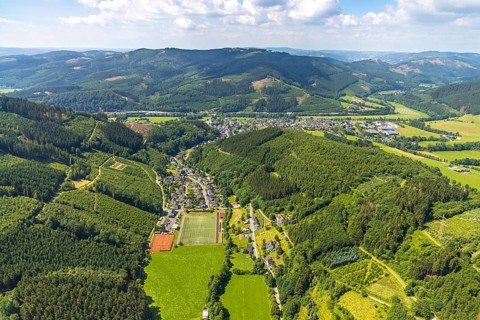 Aerial view, forest area and tennis courts with youth training, sports field Rönkhausen,
