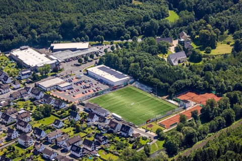 Aerial view, sports field Bamenohl, local supply centre, Schloss Haus Bamenohl, Finnentrop,