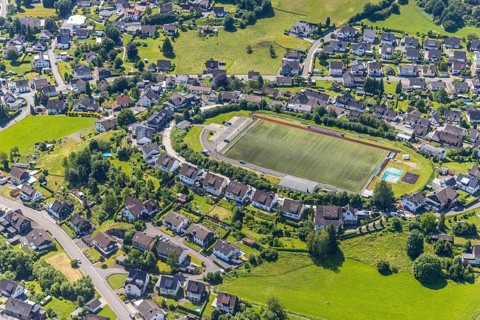 Aerial view, local view and sports field Heggen, Finnentrop, Sauerland, North Rhine-Westphalia,